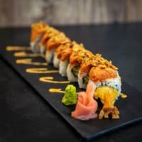 STS Roll · Shrimp tempura, avocado, topped with spicy tuna, spicy mayo, eel sauce, and crunch.