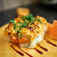 Boss Roll · Spicy tuna, avocado topped with spicy BBQ salmon, eel sauce, and scallions.