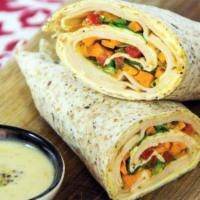 2. Classic Egg Wrap  · Boar's head ham, 2 eggs cheese and home fries on a white wrap. 