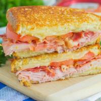 7. The Plaza Sandwich Combo · Chicken cutlet, ham, Swiss cheese and mayo. 