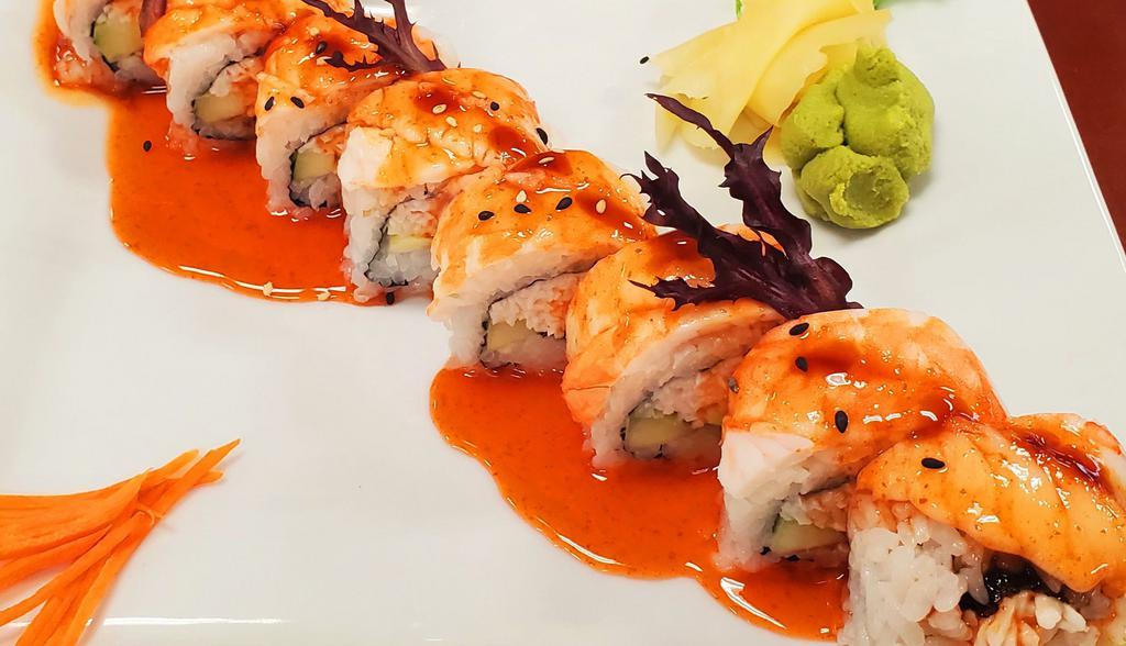 36. Delish sweet sriracha black tiger roll (spicy) · Crab meat and avocado inside topped with butterfly shrimps, sriracha sauce and house special(black sugar base) sauces. spicy & sweet