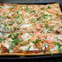 Fuhgeddaboudit Pizza · Grandma pie topped with fresh mozzarella cheese, diced tomatoes, chopped garlic and basil. 1...