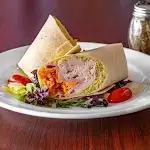 5. Mondo Wrap · Ham, turkey, bacon, cheddar cheese, lettuce, tomato, and honey mustard.