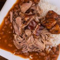 Pernil / Roasted Pork  · Pulled roasted pork served with two sides.