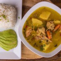 Sancocho · Classic Hispanic Soup mixed with hen, oxtails, beef, and vegetables.