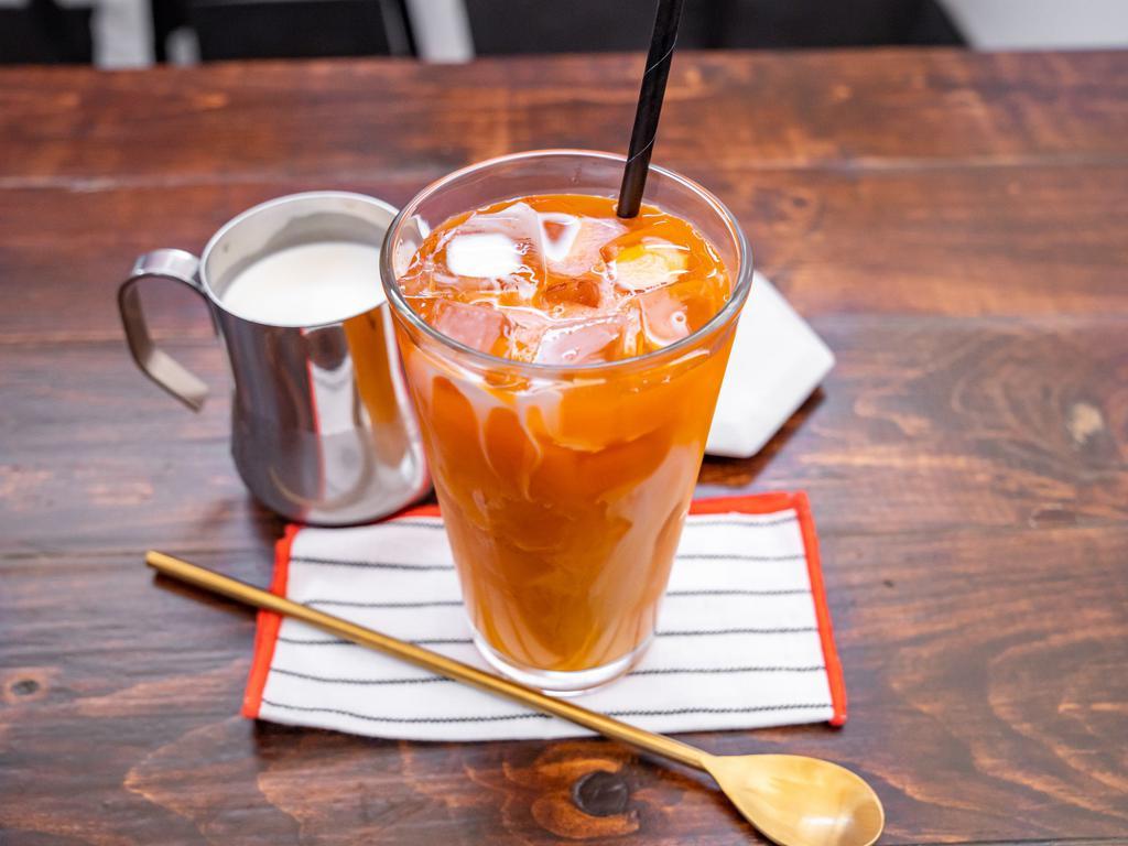 Thai Iced Tea · Freshly brewed Thai tea, sweetened with creamy condensed milk. No powdered stuff over here! Contains dairy