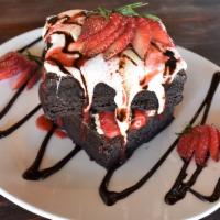Bombshells Brownie · DOUBLE STACKED HOMEMADE BROWNIES FILLED WITH SWEET CINNAMON CREAM CHEESE, FRESH STRAWBERRIES...