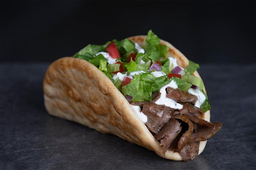 Gyro Wrap Meal · Lettuce, red onion, tomatoes and Z-sauce wrapped in a grilled pita.