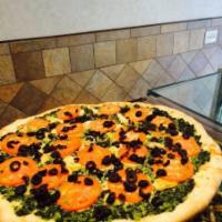 Vegetarian Pie · Combination of spinach, broccoli, mushroom, peppers, onions, mozzarella and tomato sauce.