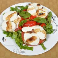 Insalata Caprese · Fresh mozzarella, tomato and roasted peppers.