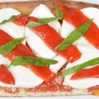 Grandma Pizza Slice · Fresh tomatoes, fresh mozzarella, roasted peppers and basil.