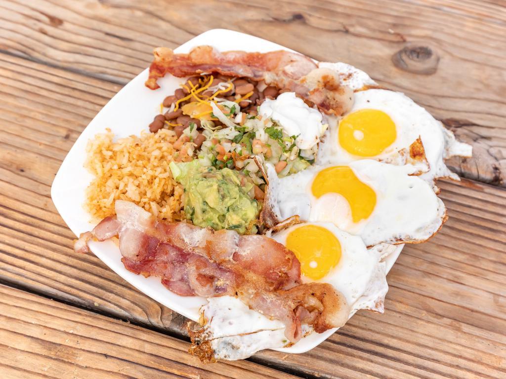 Huevos Rancheros · Four eggs, your choice of meat, beans, rice, guacamole, sour cream, pico de Gallo and cheese. Corn tortillas on the side. Egg cooked to your liking( sunny-side-up, over-hard...)