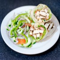 28. Chicken Caesar Wrap · Grilled breast of chicken, leaf lettuce, Romano cheese, tomatoes and Caesar dressing.