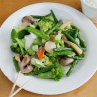 90. Mixed Vegetables with Cashew Nuts · Served with rice.