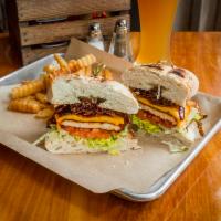 DTR Signature Chicken · Seasoned grilled chicken sandwich with candied house bacon, American cheese, fried onions, l...