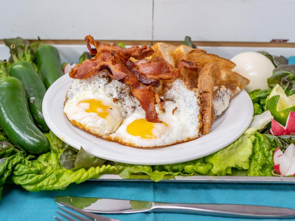 Breakfast Platter · 2 eggs ,bacon or ham with home fries and toast 