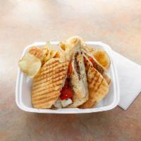 Brooklyn Panini · Italian seasoned grilled chicken, fresh mozzarella, roasted red peppers and balsamic vinaigr...