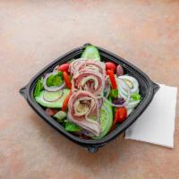 Chef Salad · Tossed salad topped with hard boiled egg and sliced roast beef, ham, turkey and Swiss cheese...