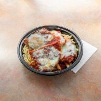 Chicken Parmigiana · Over linguini sprinkled with Romano and complete with soup or salad.