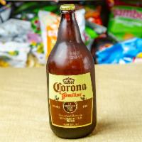 CORONA FAMILIAR 32OZ BTL · Must be 21 to purchase. Mexico- American-Style Lager- 4.8% ABV. A traditional cerveza, Coron...