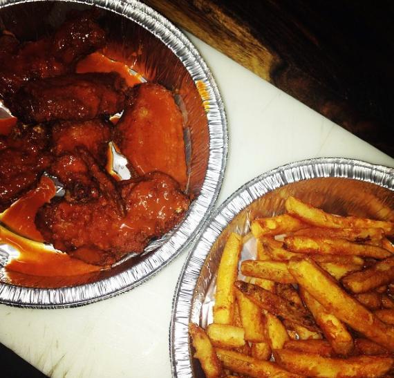 Wings with Fries · Cooked wing of a chicken coated in sauce or seasoning.