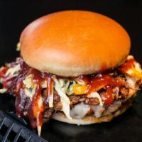 Animal & Fries · 1/3 lb. beef patty topped with 
Smoked Pulled-pork, BBQ Sauce, bacon, onion, Texas Sweet-sla...