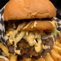 Animal House & Fries · OUR BIGGEST BURGER AVAILABLE
Smoked Beef Brisket
Braised-Smoked-Pulled Pork
Bacon
Beef patty...