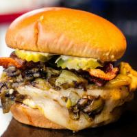 Low Rider & Fries · 1/3 lb. beef patty, roasted green chilies, onion, pickle, bacon, Jack cheese, and house sauc...