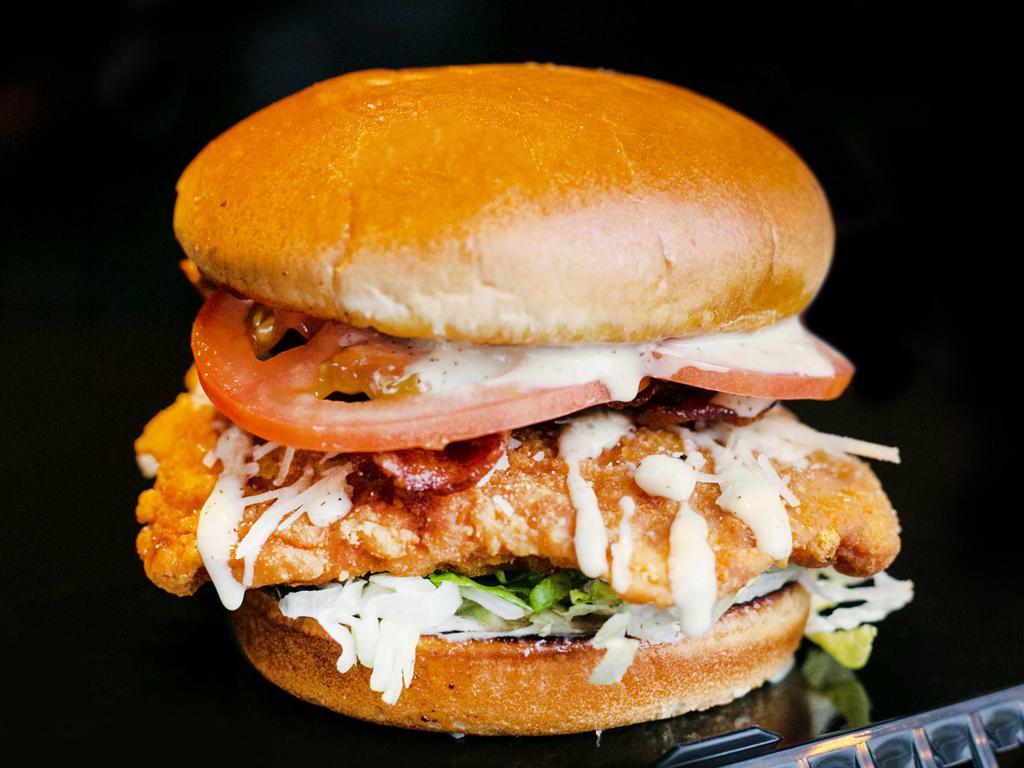 Chicken BLT & Fries · Crispy chicken breast, garlic-parm sauce, bacon, lettuce & tomato. Served with fries