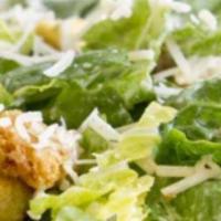 Traditional Caesar Salad · Crunchy romaine lettuce, housemade croutons, Parmigiano Reggiano cheese with creamy caesar d...