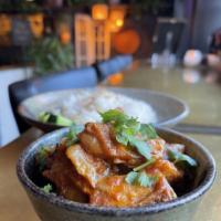 Jackfruit Curry (Vegan) · Classic Burmese style curry of Jackfruit meat marinated and cooked to perfection with fine s...