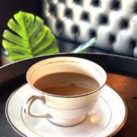 Burmese Tea · Sweetened Burmese Black Assam Tea with milk. (Serves Hot or Iced). Dairy-Free option is avai...