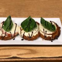 Eggplant Rolatini · Eggplant stuffed with ricotta cheese rolled up and topped with mozzarella cheese.