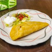 Pollo Loco Empanada · Fried pastry stuffed with grilled chicken and mozzarella cheese.