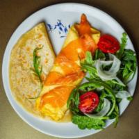 The Florentine Omelette · Fresh eggs, feta, and spinach cheese.