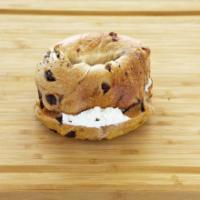 Cinnamon Raisin Bagel with Cream Cheese · Fresh cinnamon raisin bagel smothered with cream cheese.