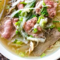 P0. House Pho Noodle Soup 经典火车头 · Comes with Rare Eye Roud, Brisket, Tripe and Tendon, with rice noodles, served with beef bro...