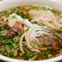 P1C. Cooked Beef Pho Noodle Soup 熟牛肉越南河粉 · Cooked Beef  with rice noodles, served with beef broth, onions, scallions, and lemon, basil ...
