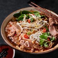 P2. Spicy Beef Pho Noodle Soup 辣熟牛肉河粉 · Cooked Beef with rice noodles, served with spiced beef broth, onions, scallions, and lemon, ...