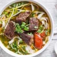 P3. Beef Stew Pho Noodle Soup · Beef Stew.  with rice noodles, served with spiced beef broth, onions, scallions, and lemon, ...