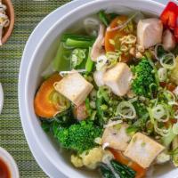 P7. Vegetarian Pho Noodle Soup · Mixed vegetables, with rice noodles, served with vegetarian broth soup, onions, scallions, a...