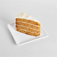 Classic Carrot Cake (Slice) · Layers if incredibly moist carrot cake studded with raisins, walnuts, and pineapple, topped ...
