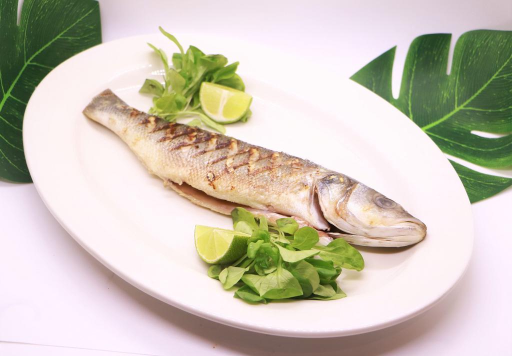 Pescado a la Parrilla · Whole Mediterranean Sea Bass, Fileted and Head Off, Grilled with Extra Virgin Olive Oil and Thyme.  