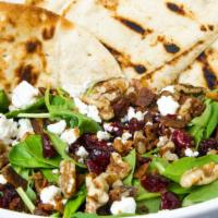 Baby Spinach Salad · Baby spinach, bacon, goat cheese, dried cranberries and walnuts.