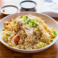 Thai Fried Rice · Stir-fried Thai Jasmine rice in soy sauce with your choice of meat, egg, carrot, broccoli, a...