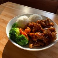 General Tso's Chicken · crispy chicken served with ginger flavored sauce & steamed jasmine rice