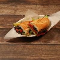 100. Green Lantern Sandwich · Romaine lettuce with grilled portobello mushrooms, roasted peppers, fresh basil, olive oil a...