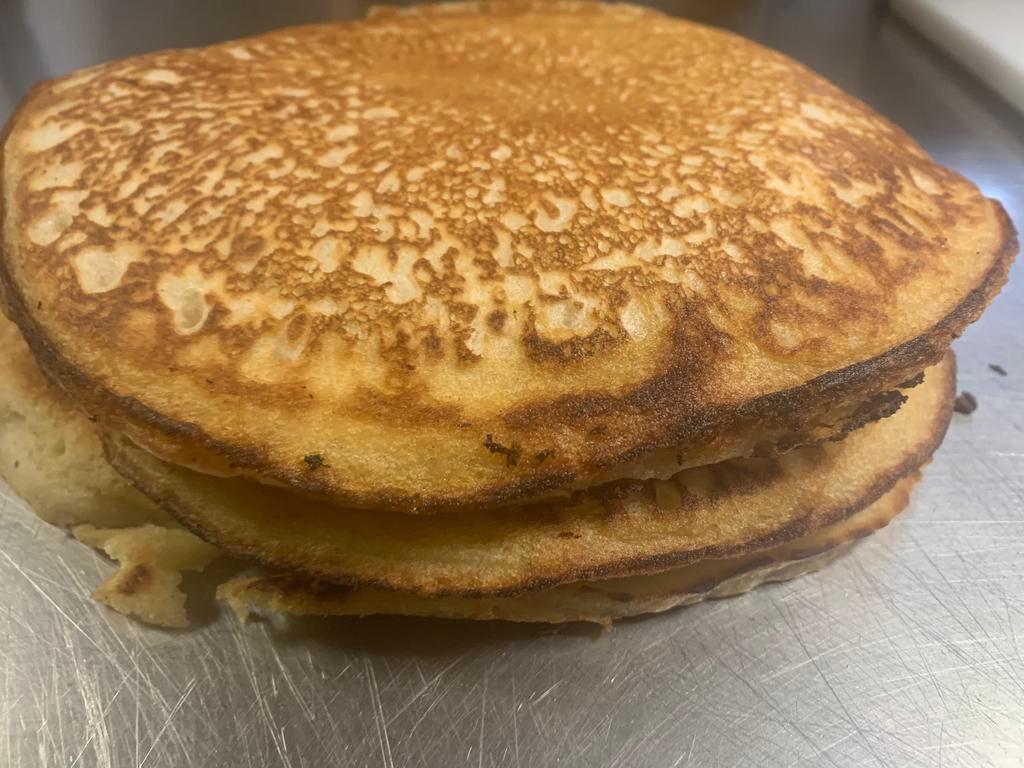 Pancakes · 3 pan sized pancakes.  Comes with unsalted butter & maple syrup.