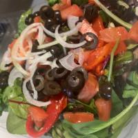 Mixed Green Salad · Spring mix, olives, roasted peppers, tomatoes, onions and croutons.