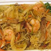 43. Singapore Noodles · Stir-fried rice noodles seasoned with curry powder, vegetables, pork, and shrimp. Curry Flav...